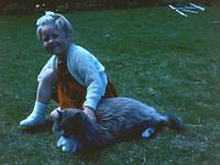 Young Robyn with cats