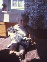 Young Robyn with cats